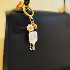 Pickleball Daisy Bag Charm – Sporty Floral Accessory with Paddle and Daisy Charms-1